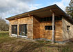 Maison avec un bardage bois en chataignier réalisée par ECOP Habitat