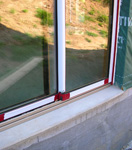 Fenetre sur une maison en bois Ecop Habitat